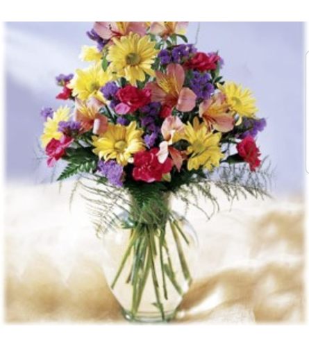Little Pick Me UP. An arrangement by Avenue Flowers and Gifts.