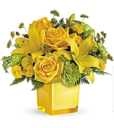 Flight of the Canary. An arrangement by Avenue Flowers and Gifts.