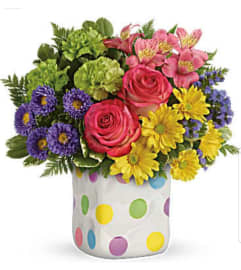 Festive Dots. An arrangement by Avenue Flowers and Gifts.