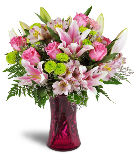 Perfectly Pink™ - Deluxe. An arrangement by Avenue Flowers and Gifts. Your arrangement will include bright pink roses, carnations, and...