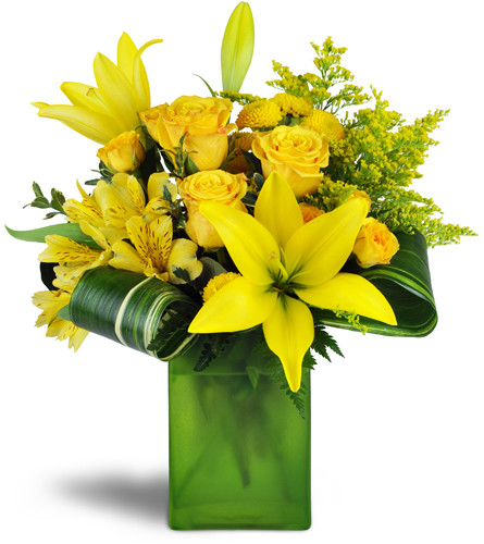 Sunshine and Citrus™. An arrangement by Avenue Flowers and Gifts. Make them smile with a sunny bouquet of yellow lilies, roses, spray roses, and...