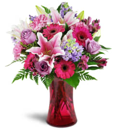 Bright Medley™. An arrangement by Avenue Flowers and Gifts.