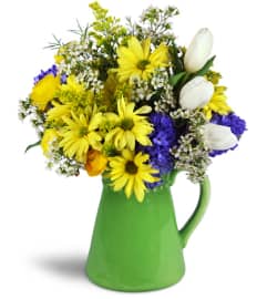 Garden Gathering™. An arrangement by Avenue Flowers and Gifts.