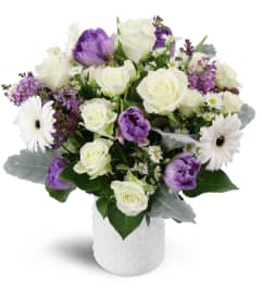 Oasis in Bloom™. An arrangement by Avenue Flowers and Gifts. Oasis in Bloom™. An arrangement by Avenue Flowers and Gifts.