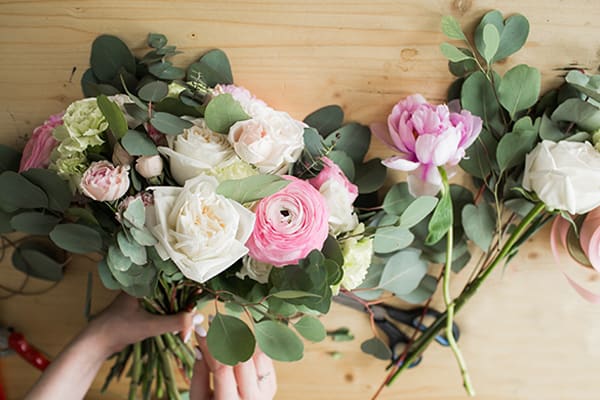 Avenue Flowers & Gifts florist arranging flowers