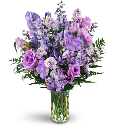 Purple Passion - Deluxe. An arrangement by Avenue Flowers and Gifts. Monk's hood, delphinium, veronica, purple lisianthus, Monte Cassino asters,...