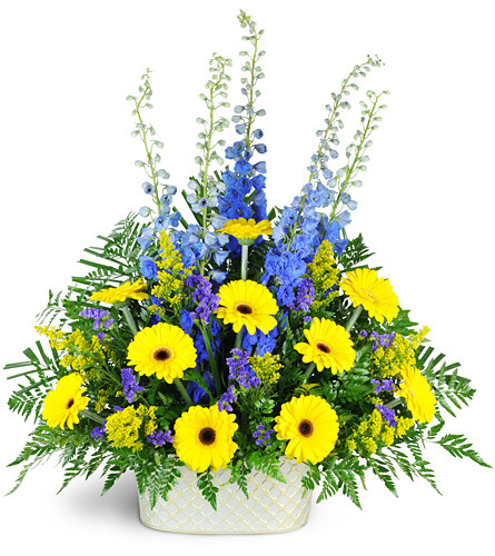 Joyful Memories. An arrangement by Avenue Flowers and Gifts. This uplifting mix of delphinium, yellow Gerbera, solidago, statice, and more can be...