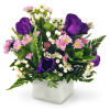 Wishes and Kisses - Standard. An arrangement by Avenue Flowers and Gifts. Delicate lisianthus, miniature daisies, and waxflowers are beautifully...