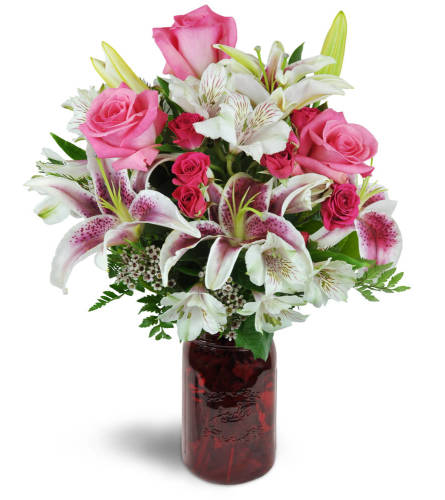 Classic Love Bouquet™ - Deluxe. An arrangement by Avenue Flowers and Gifts. Overflowing with pink roses, Stargazer lilies, Peruvian lilies, spray...