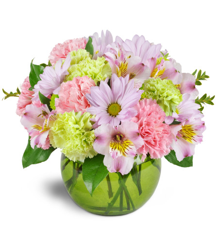 The Spring Forward Bouquet™ - Deluxe. An arrangement by Avenue Flowers and Gifts. Pastel pink and green carnations, daisies, alstroemeria, and...
