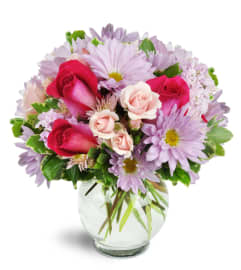 Sweet Surprise™. An arrangement by Avenue Flowers and Gifts.