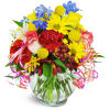 Celebrating You!™ - Deluxe. An arrangement by Avenue Flowers and Gifts. Roses, carnations, lilies, and more are arranged in a glass vase..