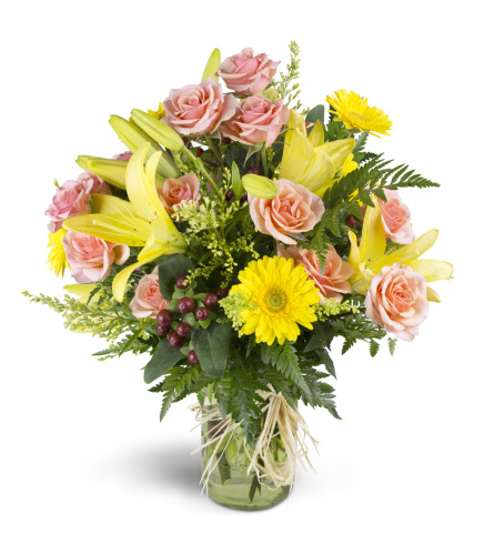 Sweet and Sunny™ - Deluxe. An arrangement by Avenue Flowers and Gifts. Soft pink spray roses and bright yellow mini Gerbera daisies are cheerfully...