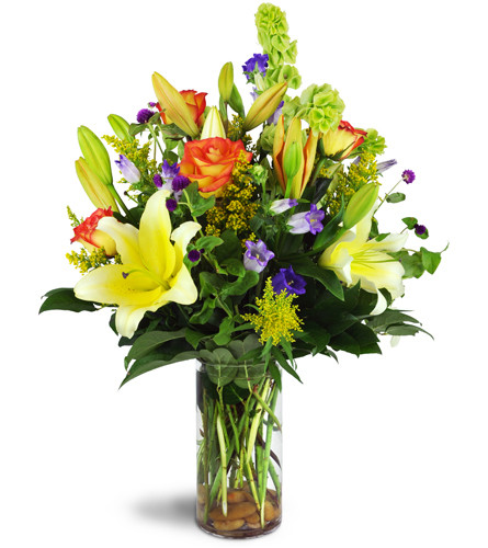 Garden Splendor Bouquet™. An arrangement by Avenue Flowers and Gifts. Surprise them with lilies, roses, and more arranged in a glass vase and...