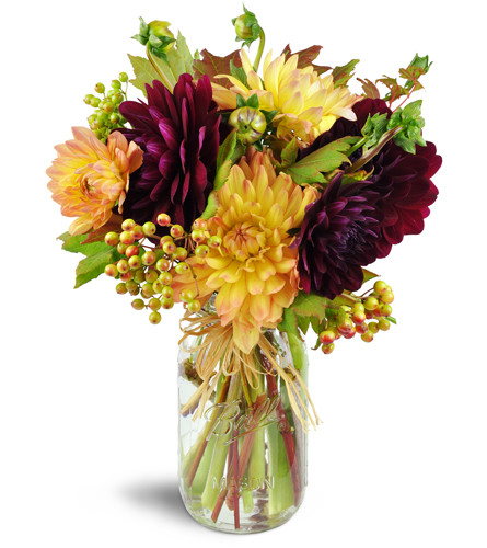 Country Reveries™. An arrangement by Avenue Flowers and Gifts. Dahlia blooms, vine maple leaf, and viburnum berries are classically arranged in a...