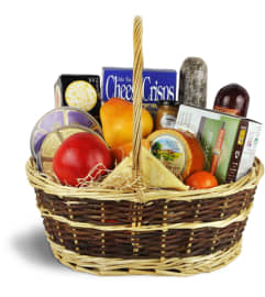 Warm Wishes Gourmet Basket. An arrangement by Avenue Flowers and Gifts.