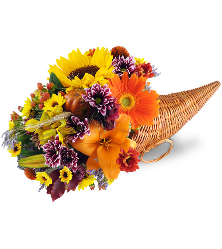Harvest Cornucopia™ for Fall. An arrangement by Avenue Flowers and Gifts. A bountiful mixture of lilies, sunflowers, Gerbera daisies, mums, and...