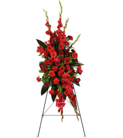 Always Remembered Sympathy Spray™. An arrangement by Avenue Flowers and Gifts.