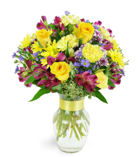 Enchanted Fields™ - Deluxe. An arrangement by Avenue Flowers and Gifts. A magical mix of purple and yellow alstroemeria, daisies, and aster...