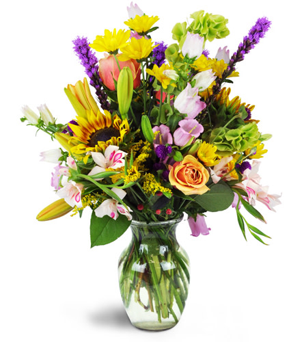 Summer's Sweet Song™. An arrangement by Avenue Flowers and Gifts. Sunflowers, miniature gladiolus, roses, lilies, and more are stylishly arranged...